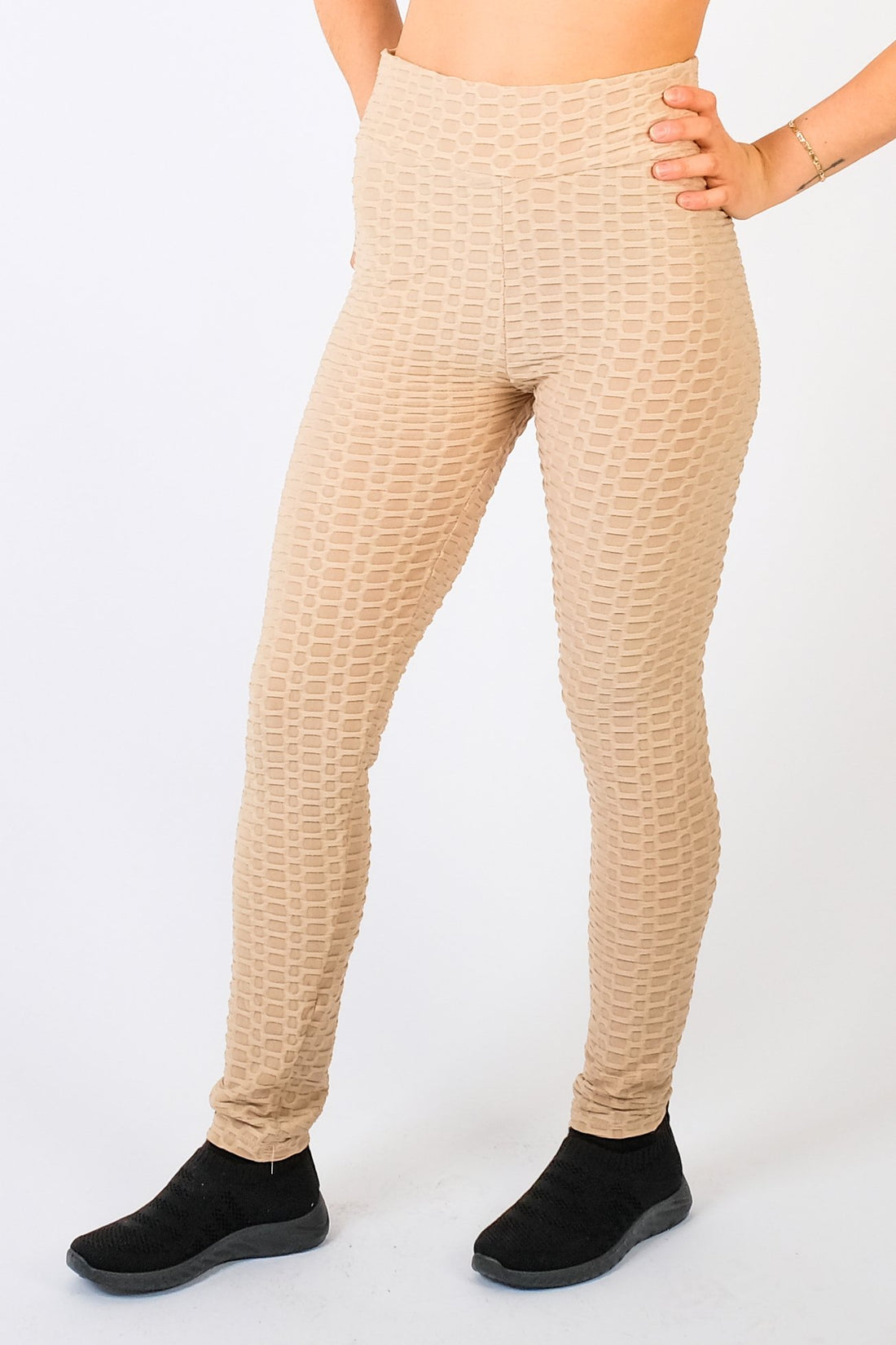 https://pinstripe.online/cdn/shop/products/honeycomb-waffle-textured-active-wear-stretch-leggings-523136.jpg?v=1620879042&width=1100